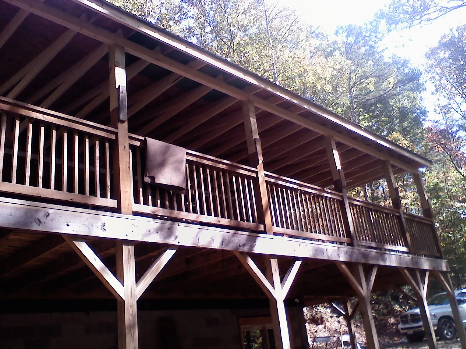 Timber framing under a new elevated porch and deck — Roof Leak Repair in North Branch by Roofing Brothers